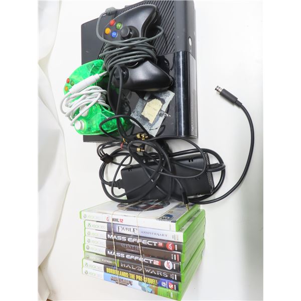 Xbox 360 console with controllers and games