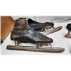 Image 10 : Collection of Antique ice skates and 2 hockey pucks