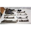 Image 1 : Collection of Antique ice skates and 2 hockey pucks