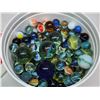 Image 1 : Container of assorted glass marbles