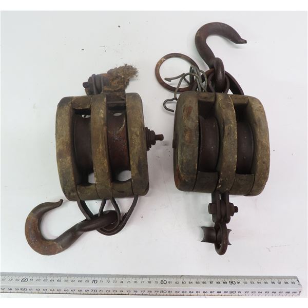 2 vintage wooden pulleys