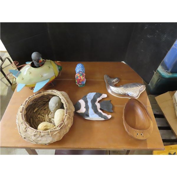 Assorted decorative items - fish, wooden bowl, tin airplane, etc.