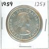 Image 1 : 1959 Canadian silver voyageur 1 dollar coin