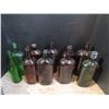 Image 1 : Lot of vintage dark olive green coloured and brwon glass whisky bottles