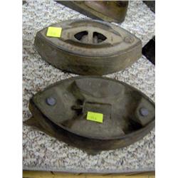 TWO SAD IRONS WITH ONE BASE