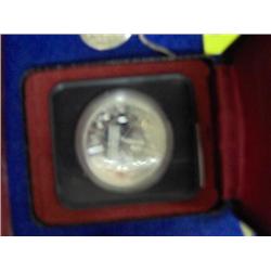 SILVER COIN IN BOX