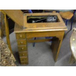 SINGER SEWING MACHINE IN STAND