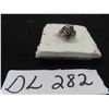 Image 1 : Oval Rhodolite Garnet 5 x 3 mm with Small Sapphire and Tanzanite