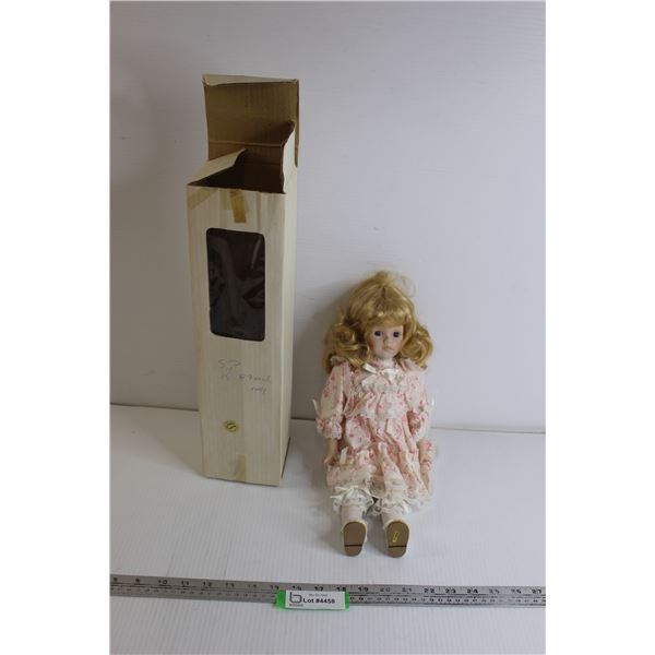Doll with Frilly Clothing
