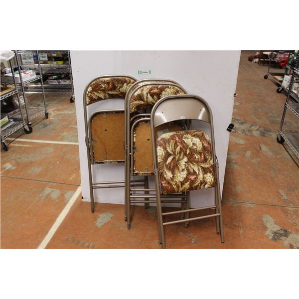 * Set of 4 Folding Chairs (small cut in one chair)