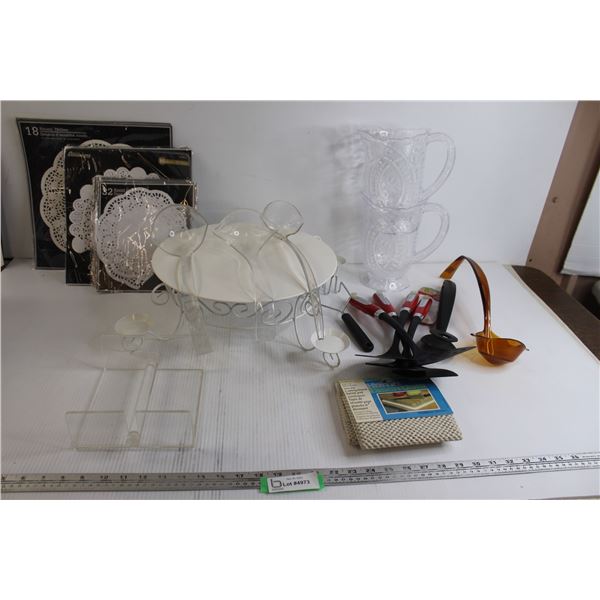 Non-Slip Safety Pads, (2) Glass Pitchers, (50+) Doilies, Misc.