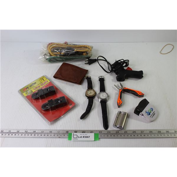 (2) Indiglow Watches (not running) - Leather wallet - Tarp Straps - Pocket Knife Multi Tool - Glue G