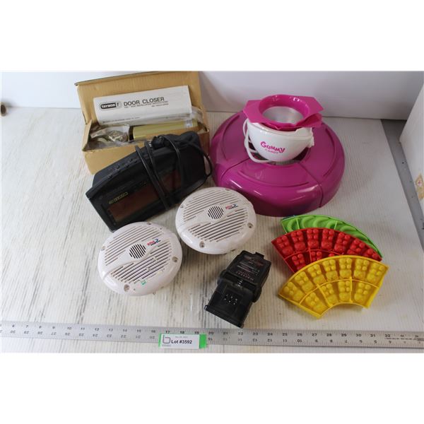 Gummy Candy Maker, Taymor Door Closer, Curtis Radio Alarm, (2) Boss Marine Speakers, (4) Plastic Mol