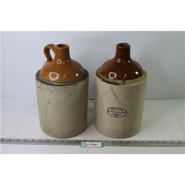 (2) Medalta Stoneware Jugs (both cracked)