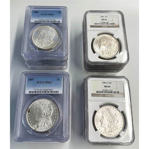 1884-1921 Morgan Dollars. A group of 29, all graded and slabbed