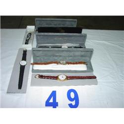 BOX OF WATCHES