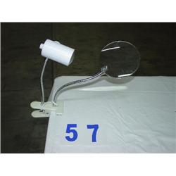 CLAMP ON LIGHT WITH A MAGINFINE GLASS