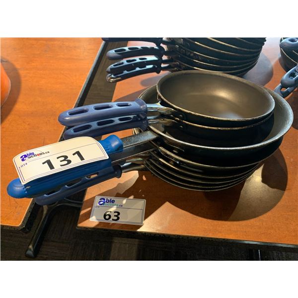 STACK OF 7 ASSORTED COMMERCIAL TEFLON FRYING PANS