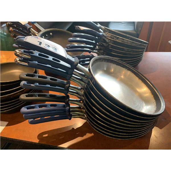 STACK OF 7 ASSORTED COMMERCIAL TEFLON FRYING PANS