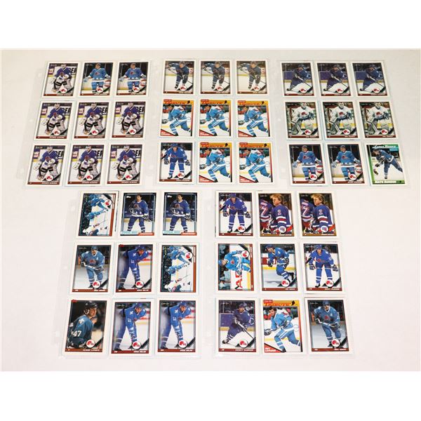 BUNDLE OF HOCKEY CARDS IN PROTECTIVE SLEEVES