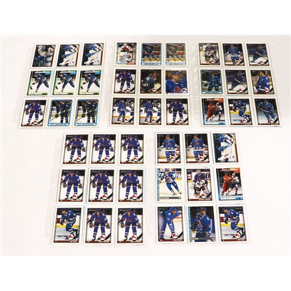 BUNDLE OF HOCKEY CARDS IN PROTECTIVE SLEEVES