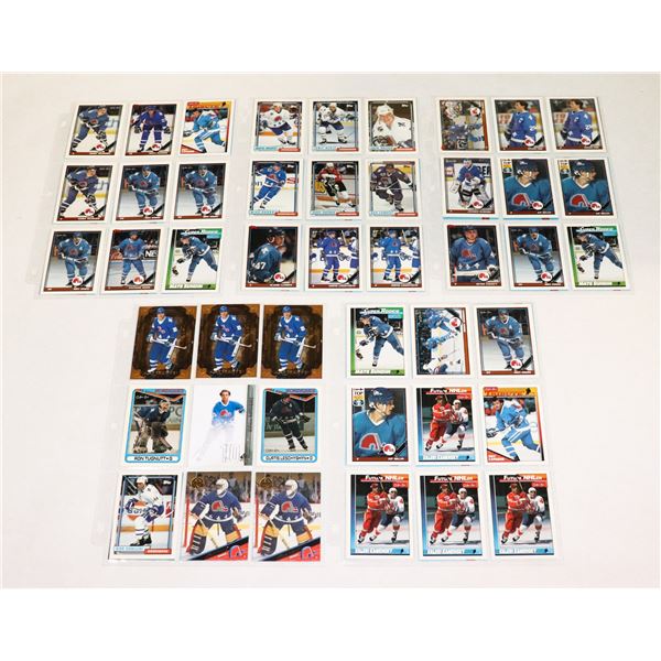 BUNDLE OF HOCKEY CARDS IN PROTECTIVE SLEEVES