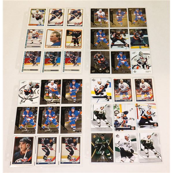 BUNDLE OF HOCKEY CARDS IN PROTECTIVE SLEEVES