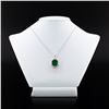 Image 1 : 9.18 ctw Emerald and 0.66 ctw Diamond 18K Yellow and White Gold Pendant
