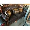 Image 1 : Brown Leather Triple Seat Carved Wood back Ornate sofa with throw cushions
