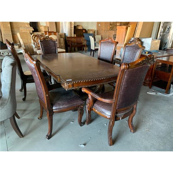 7 Piece Dinning Room suite includes large ornate walnut rectangular table and 6 matching carved wood