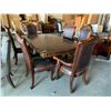 Image 1 : 7 Piece Dinning Room suite includes large ornate walnut rectangular table and 6 matching carved wood