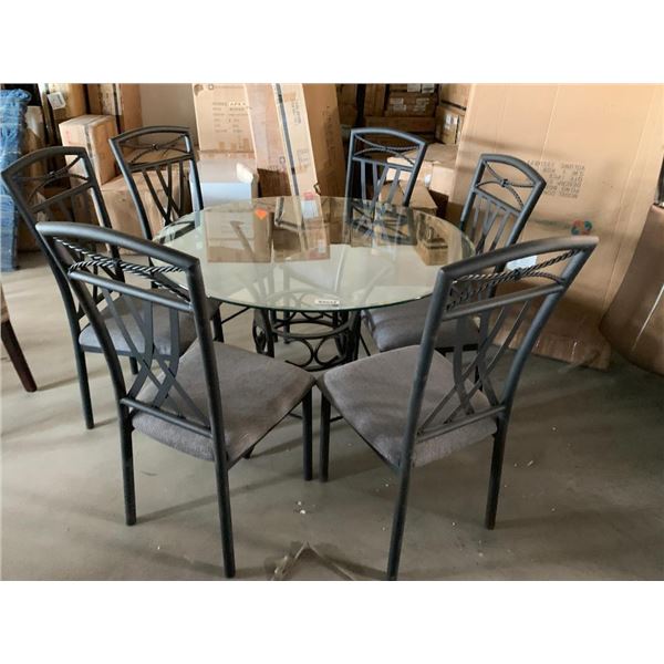 7 Piece Dinette Suite includes Round Glass top wrought iron style table with 6 matching upholstered 
