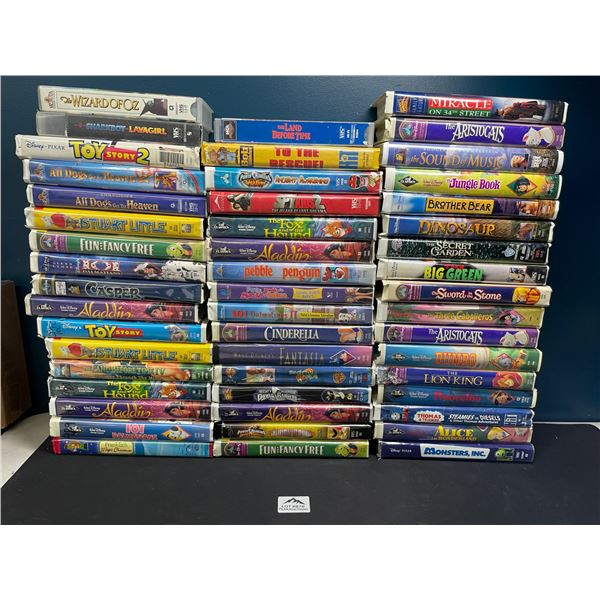 Lot of 1 Large Lot of Assorted Vintage Walt Disney & WB VHS Tapes! - Used