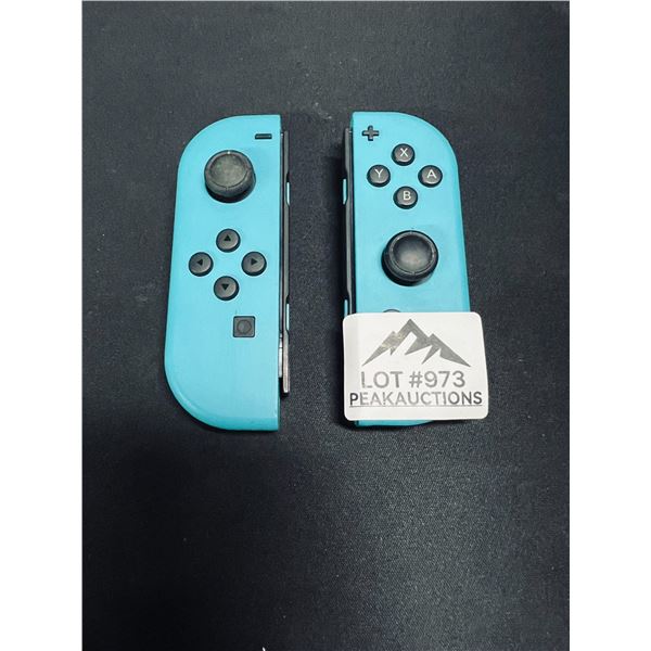 Lot of 1 Original Authentic Nintendo Switch JoyCons Blue and Blue - USED