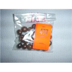 31 polished kukui nut beads