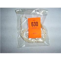 Multi-strand fresh water pearl necklace & earrings. 16"