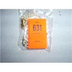 Multi-strand fresh water pearl bracelet with malachite accents