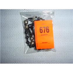 1 black onyx necklace with silver beads and carved accents, 24"