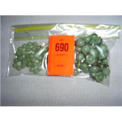 2 necklaces: 1 12mm aventurine necklace, 30". Beads are enclosed in metal hoops. 1 8mm hand knotted 