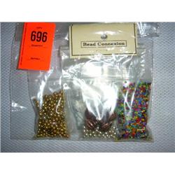 Bead jewelry kit. Bead cord, memory wire & assorted metal & glass beads.