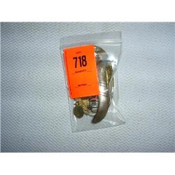 2 barrettes. 1 sterling silver. 1 brass with beads and coins