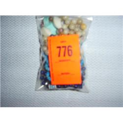 3 necklaces: 1 4mm X 7mm dyed howlite (turquoise), 34"; 1 6mm purple glass, 22"; 1 hand knotted 8mm 