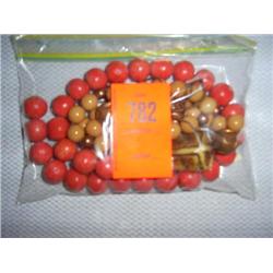 2 items: 1 12mm porcelyn necklace with copper bead accents and resin center piece, 24"; 1 strand of 