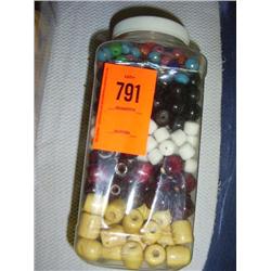 Mixed beads. Natural and dyed wood. White glass, multi-color resin and black horn.