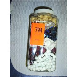 Mixed beads. Natural and dyed wood. Glass A.B. hearts, black iris glass, vintage pressed glass.