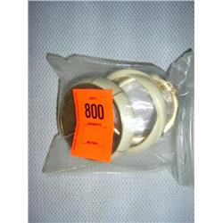 3 bracelets. 2 white resin; 1 black bone