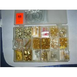 Box of findings. Assorted hardware, including eyepins, clasps, acculon cable, earring parts, crimps,