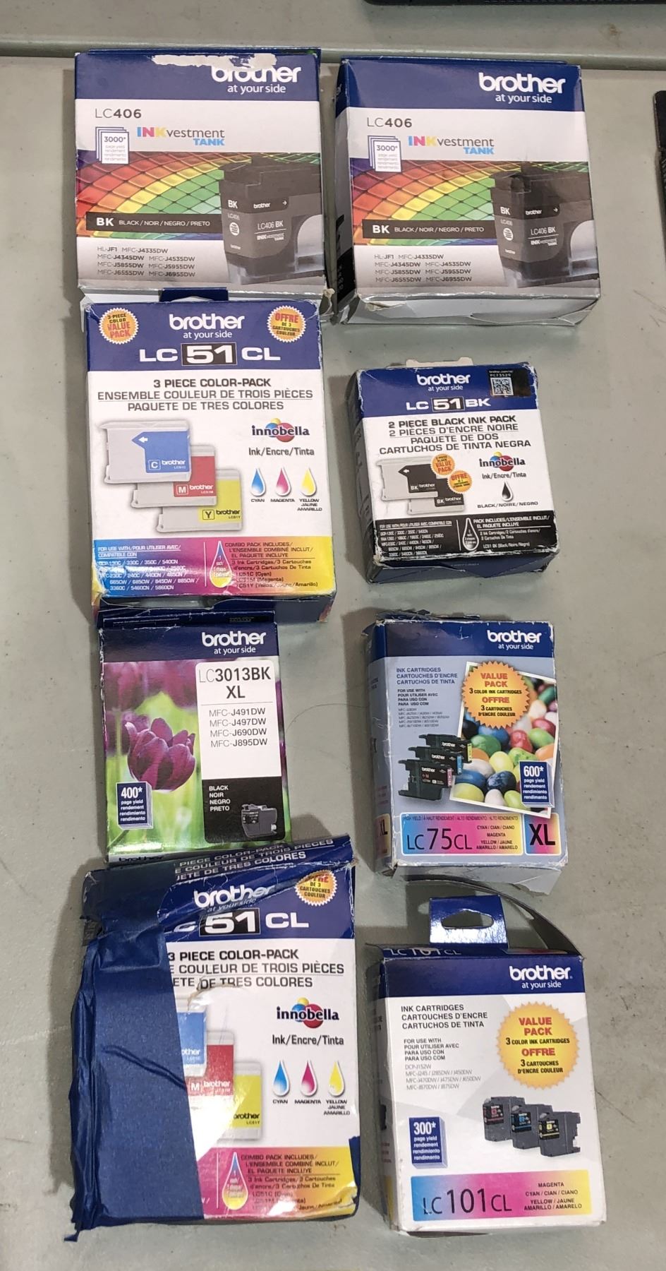 Large group of assorted Brother printer ink cartridges