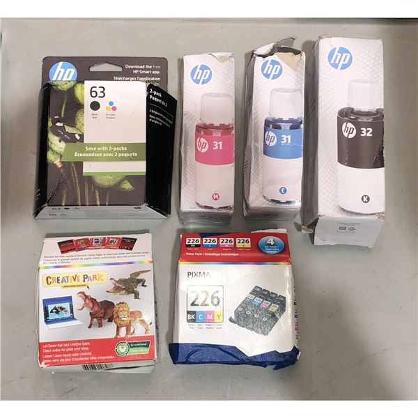 Group of assorted HP printer cartridges