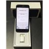Image 2 : Locked iPhone w/accessories - wire headphones and charger block